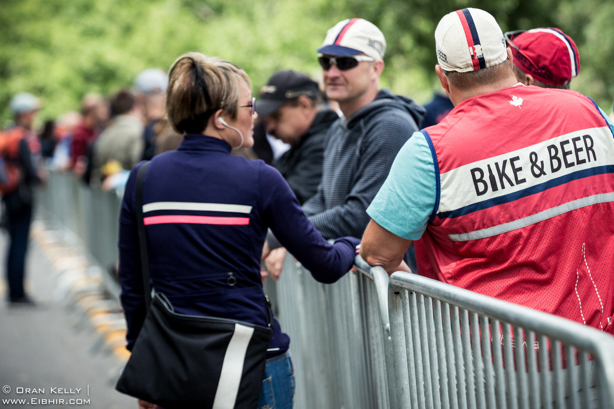 2016 Grands Prix Cyclistes de Québec et de Montréal, Montreal Race, Fans discussing perhaps bikes & beer,  while waiting for  the peloton to race past on Voie Camillien-Houde